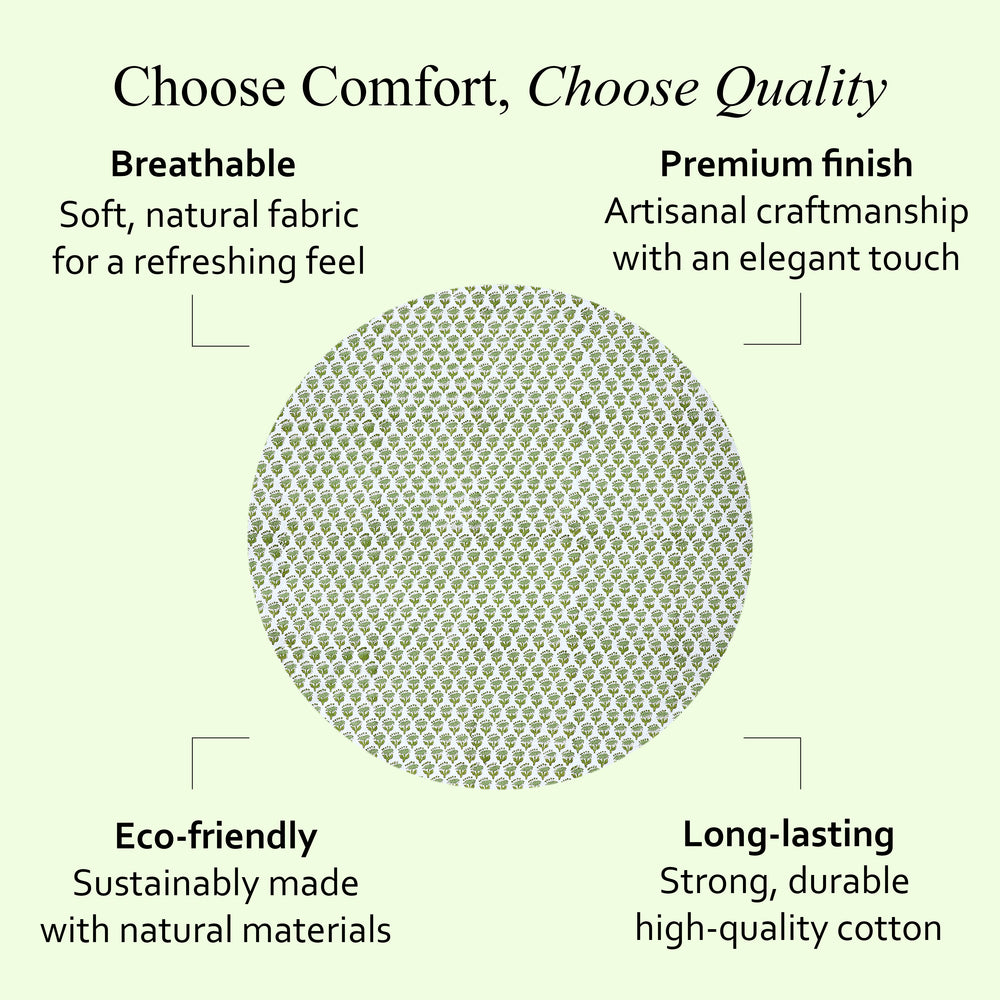 a round table with a green tablecloth on it