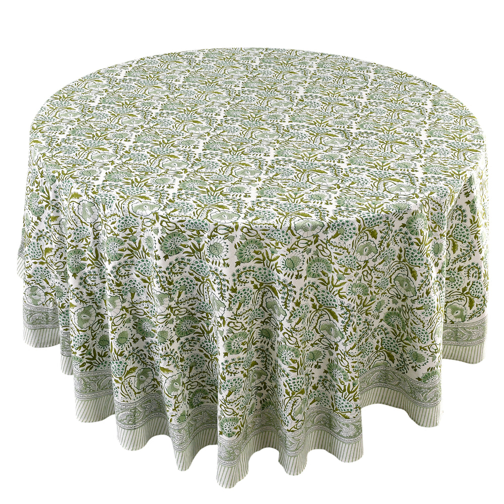 green floral round tablecloth on round family dinner table