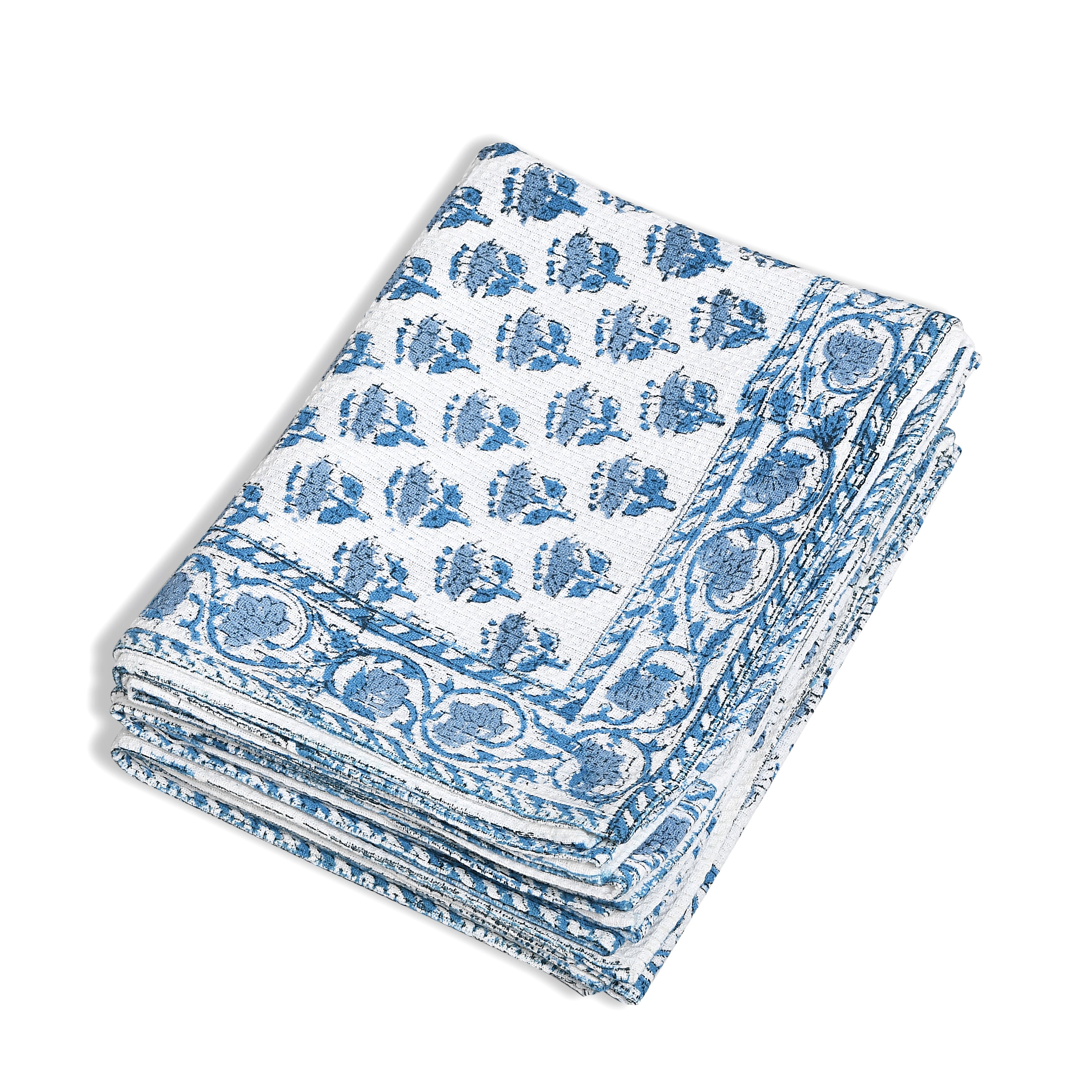 Set of three folded Apatite Blue waffle cotton towels with floral hand block print
