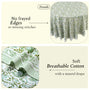 green floral round tablecloth on round family dinner table