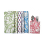 A set of colorful cotton cloth napkins with floral and geometric patterns, displayed fan-like with rolled pink napkins to the side