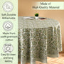 green floral round tablecloth on round family dinner table