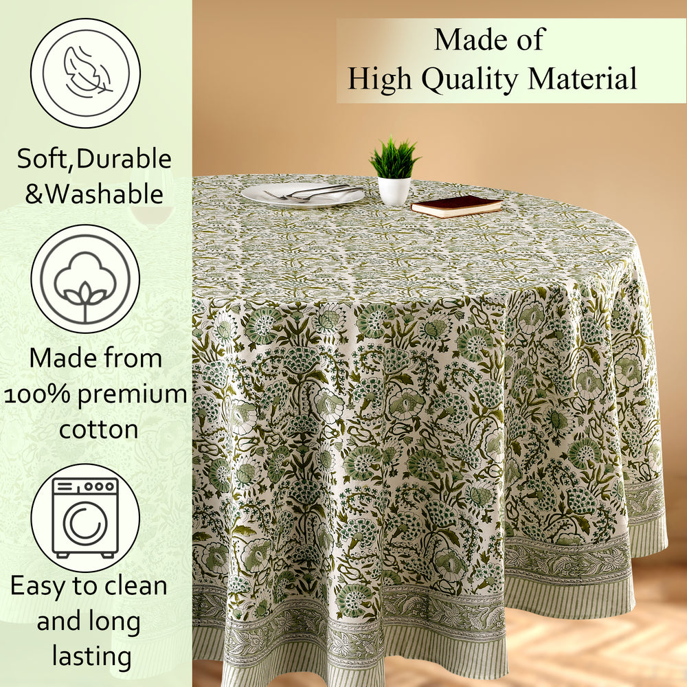 green floral round tablecloth on round family dinner table