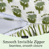 Fabric with a zipper and green floral pattern on a white background