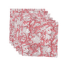 Set of six pink and white floral cloth napkins fanned out on white surface.