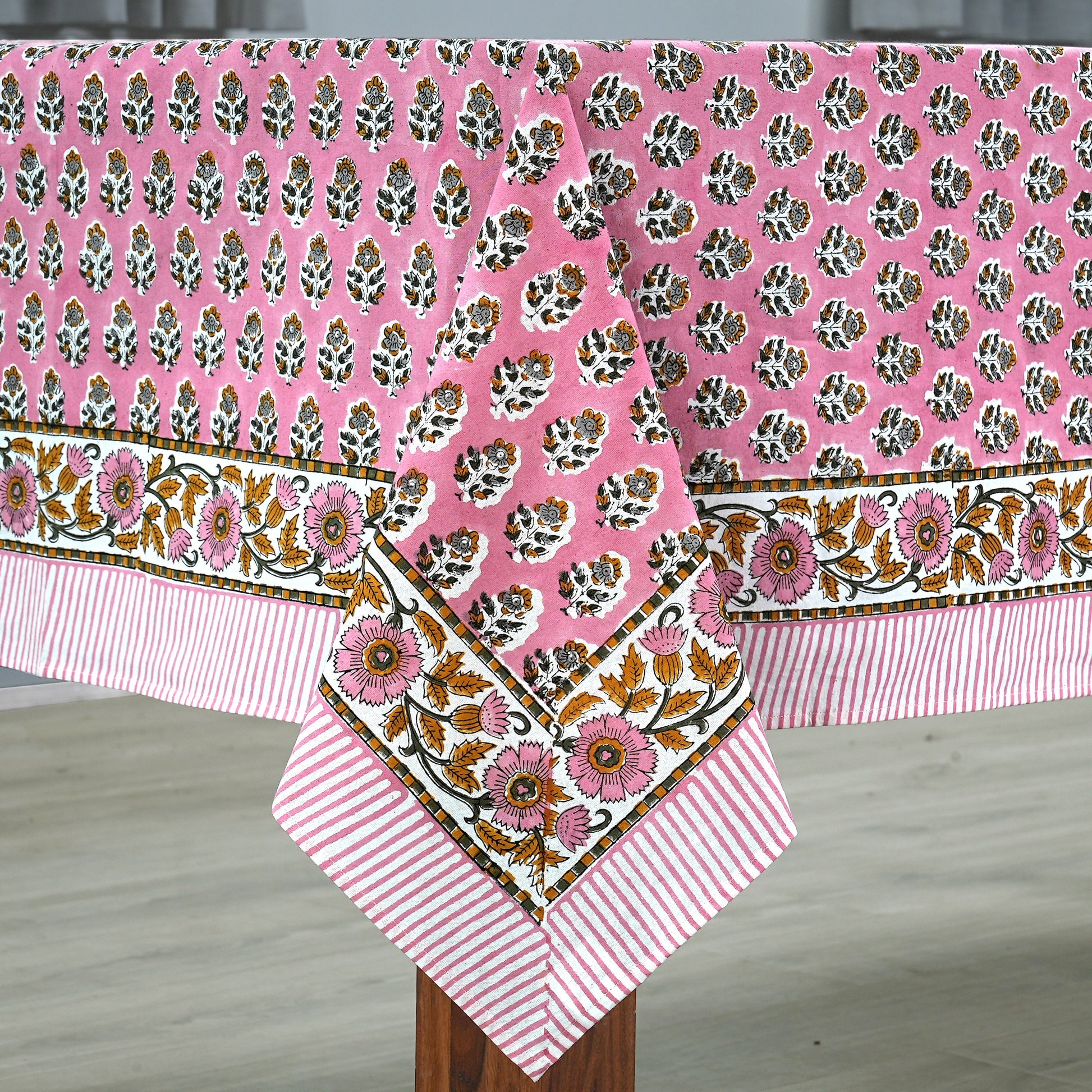 Poppy Pink Cotton Tablecloth on Side of table