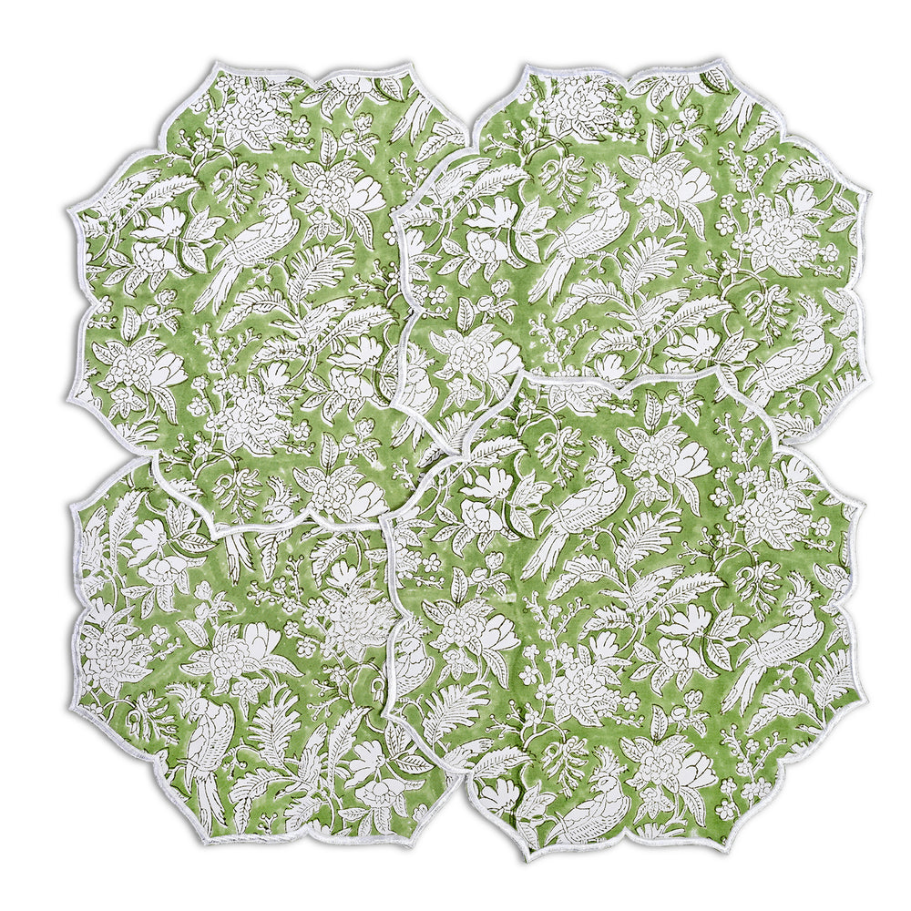 Minimalist table styling with sage green scalloped placemat