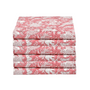 Stack of neatly folded pink floral napkins on a white background.