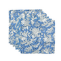 Set of six blue and white floral cloth napkins fanned out on white surface.

