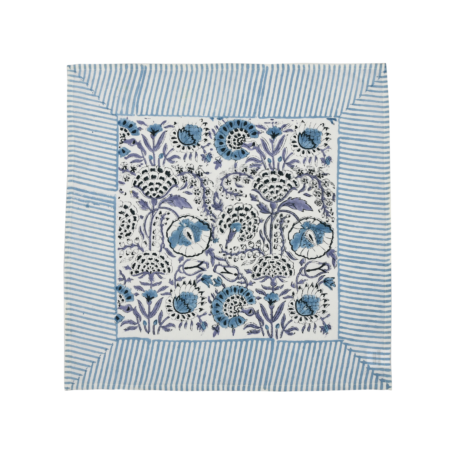 blue botanical block-printed cotton napkin in close-up.

