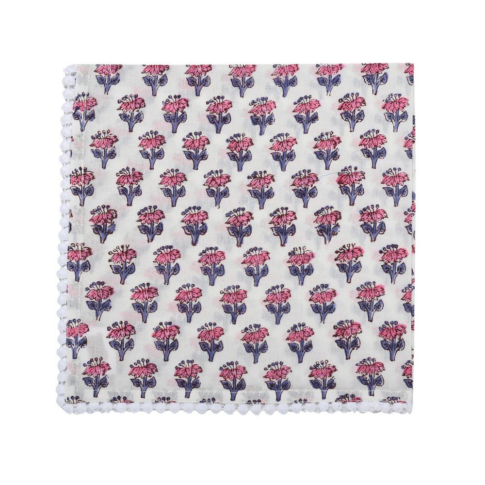 Single flat lay of pink and white floral cotton napkin.

