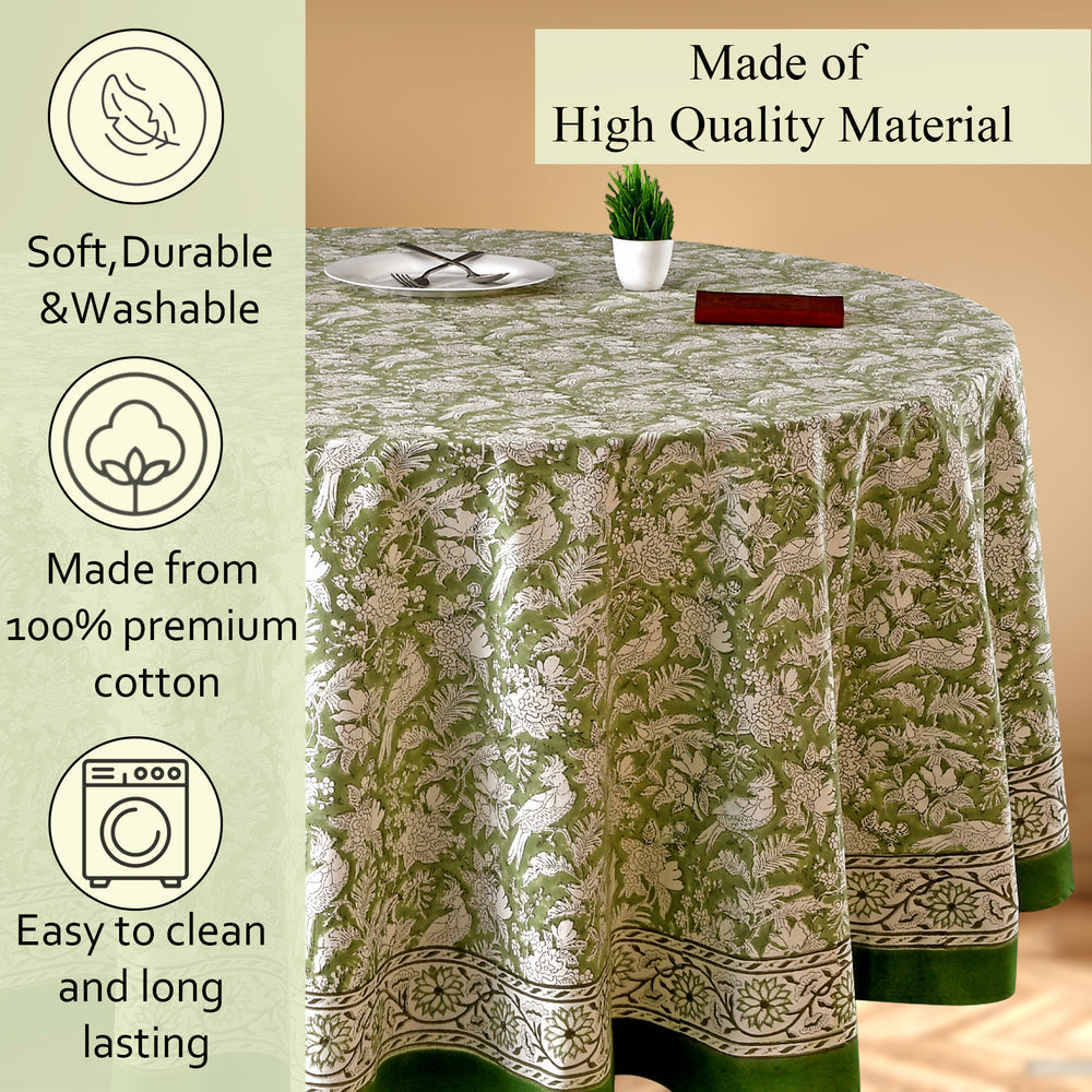 green and white round table cloth on round table with green border lining