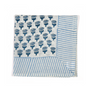 Blue block print napkin folded on  white background
