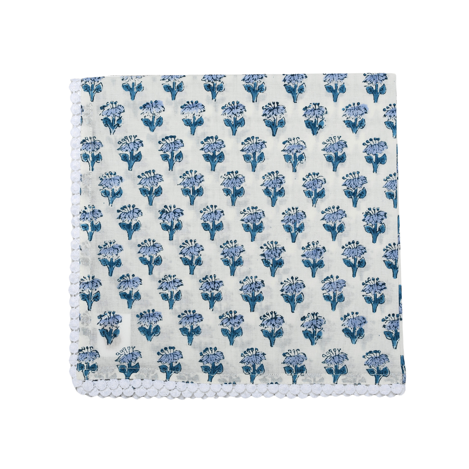 Single flat lay of blue and white floral cotton napkin.

