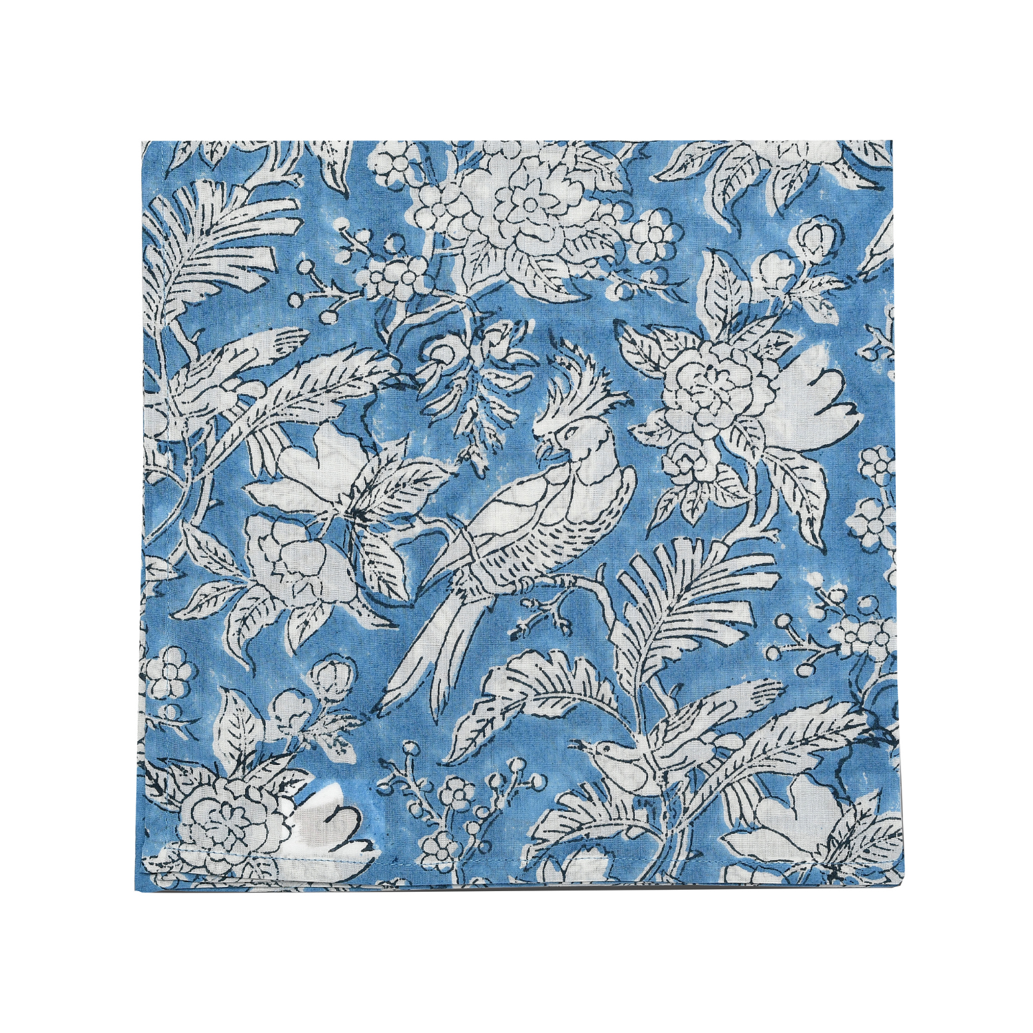 Single flat lay of blue and white floral cotton napkin.

