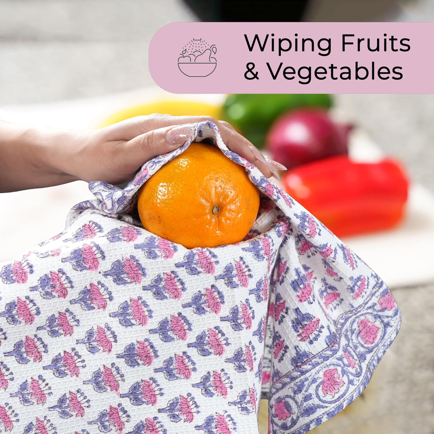 Towel beside fresh produce on a cutting board for lifestyle kitchen scene

