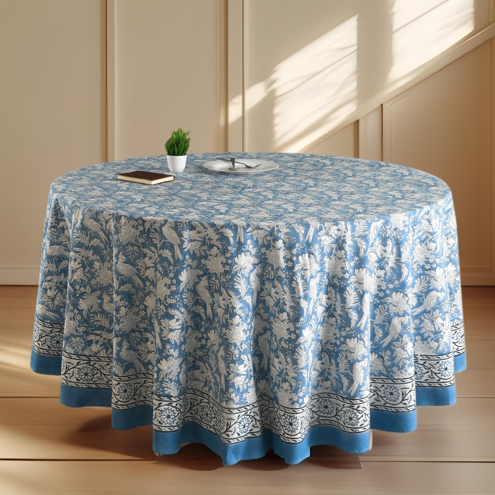 a round table with a blue and white tablecloth