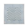 Single flat lay of blue and white floral cotton napkin.


