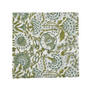 Green botanical block-printed cotton napkin in close-up.

