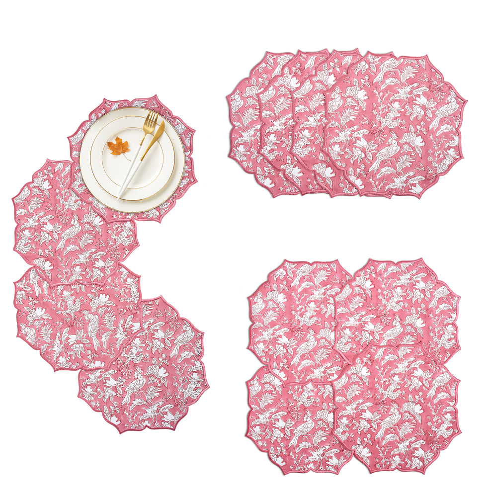 Warm coral pink cotton placemat with scalloped embroidery