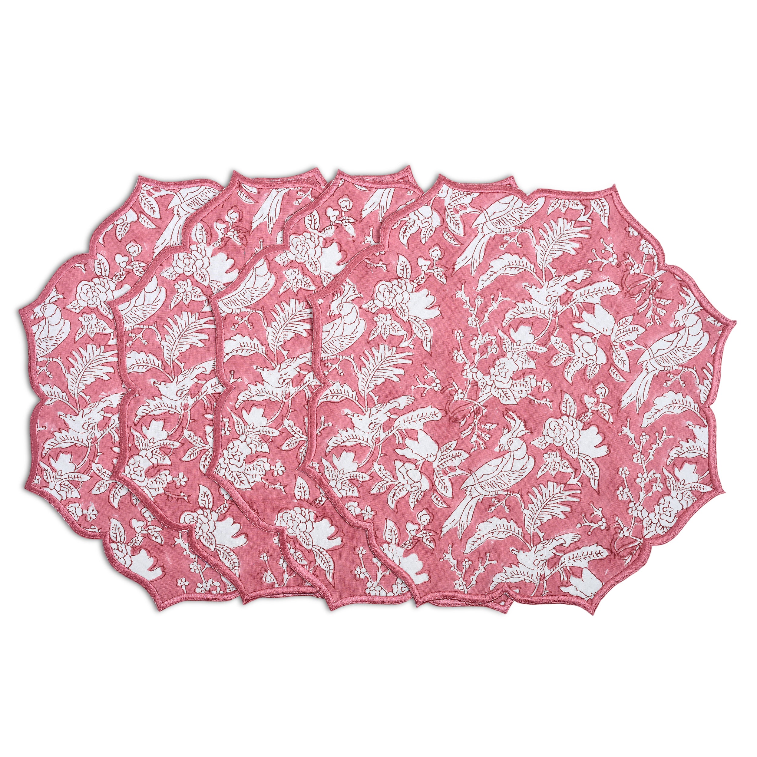 set of 4 Bright coral cotton placemat paired with pastel dishware