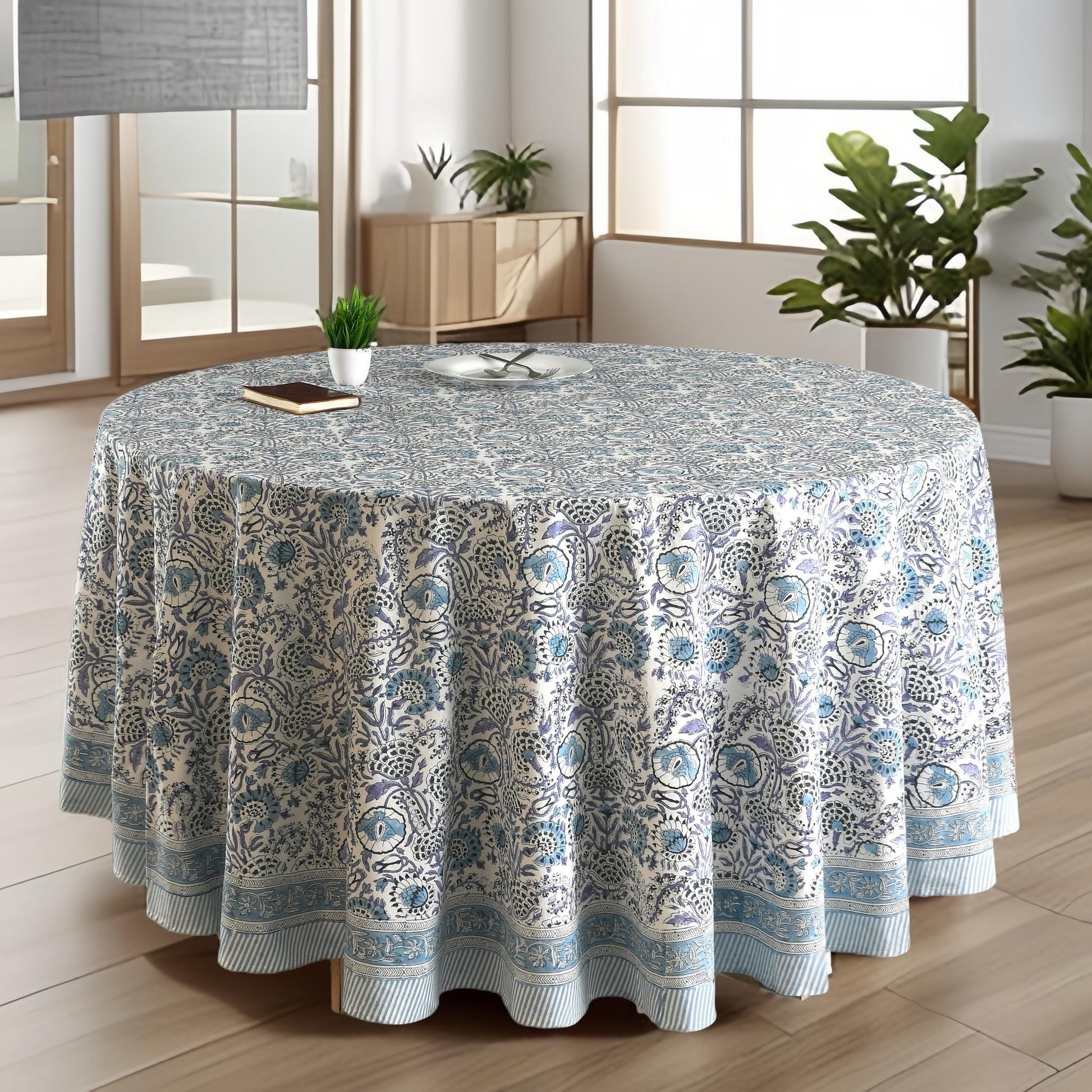 a round table with a blue and white tablecloth