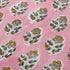 Closeup detail pattern of Poppy Pink Cotton Tablecloth on Farmhouse Table