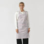lady wearing a pink and white floral cotton block print kitchen apron