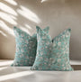Artisanal boho-style pillow covers with intricate patterns and soft cotton texture