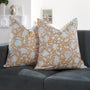 Set of 2 boho pillow covers displayed on neutral couch

