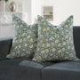 Set of 2 boho pillow covers displayed on neutral couch

