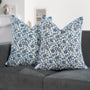 Set of 2 boho pillow covers displayed on neutral couch