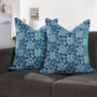 Set of 2 boho pillow covers displayed on neutral couch

