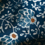 Detail of handcrafted block print on cotton boho pillow cover

