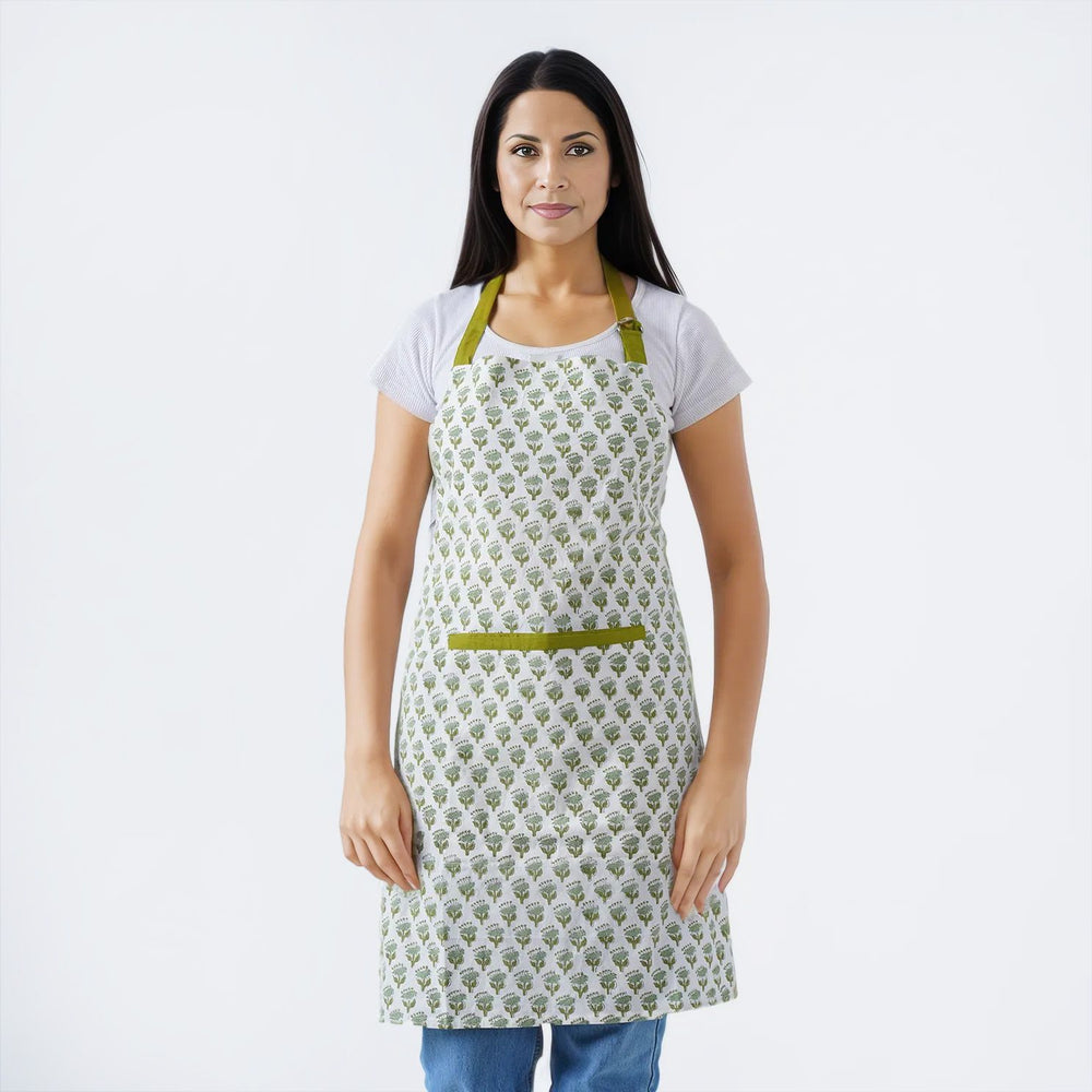 Vintage-inspired green and white apron with a floral print