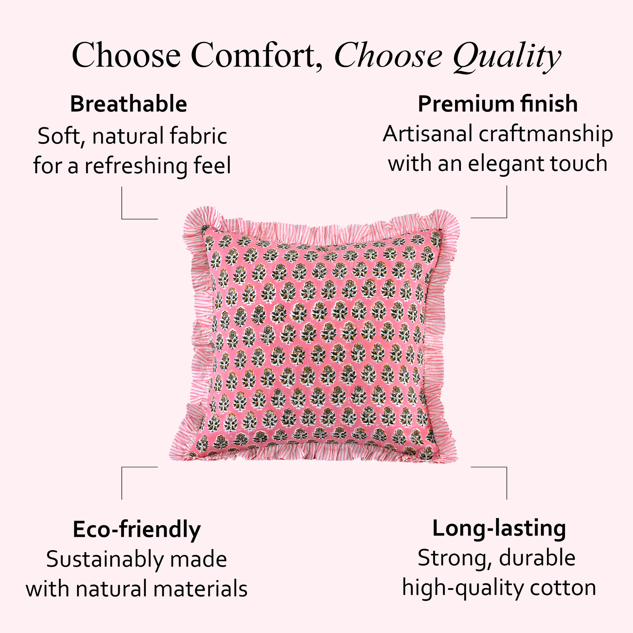 pink floral pillow with beige fringe trim displayed against a soft pink background showing fabric details.