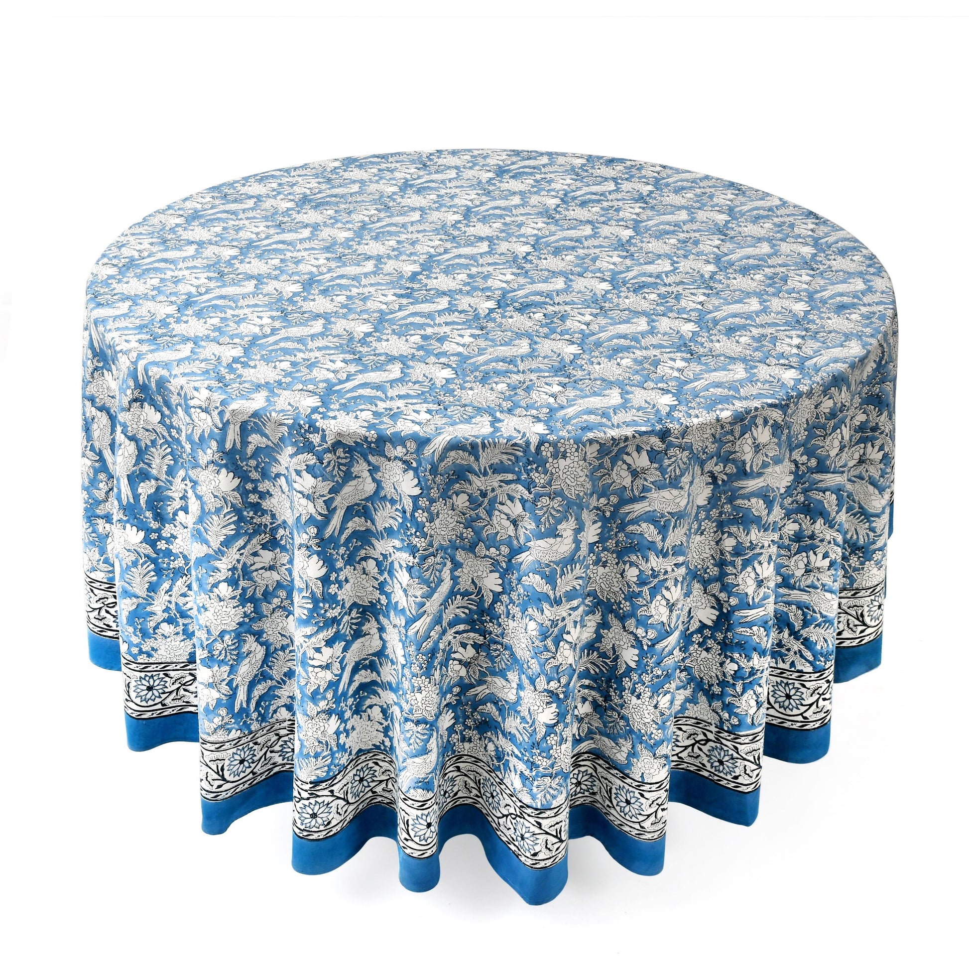 a round table with a blue and white tablecloth