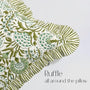 Decorative pillow with double-sided print and neat frill on a light gray background