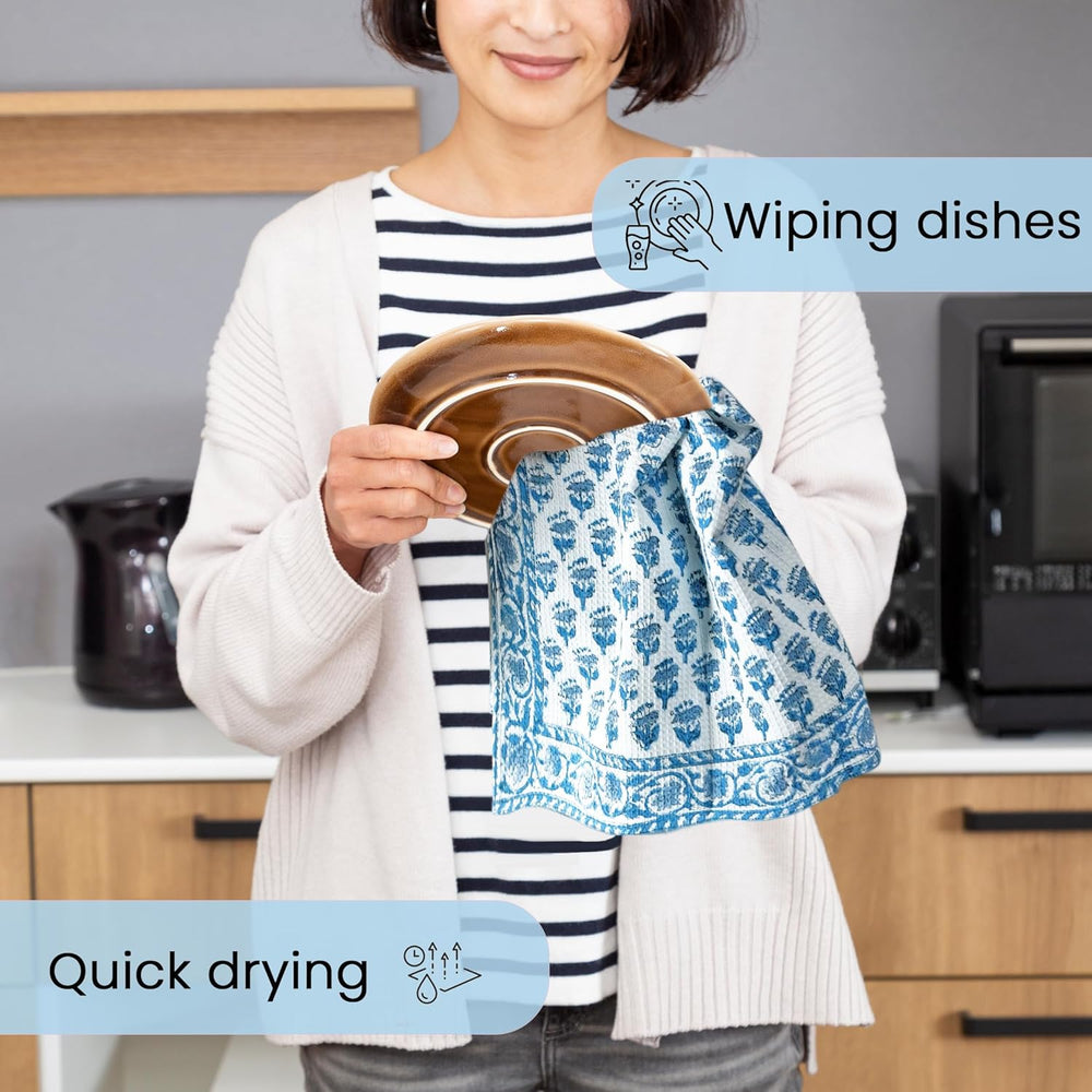 Person drying dishes with Apatite Blue hand block printed towel



