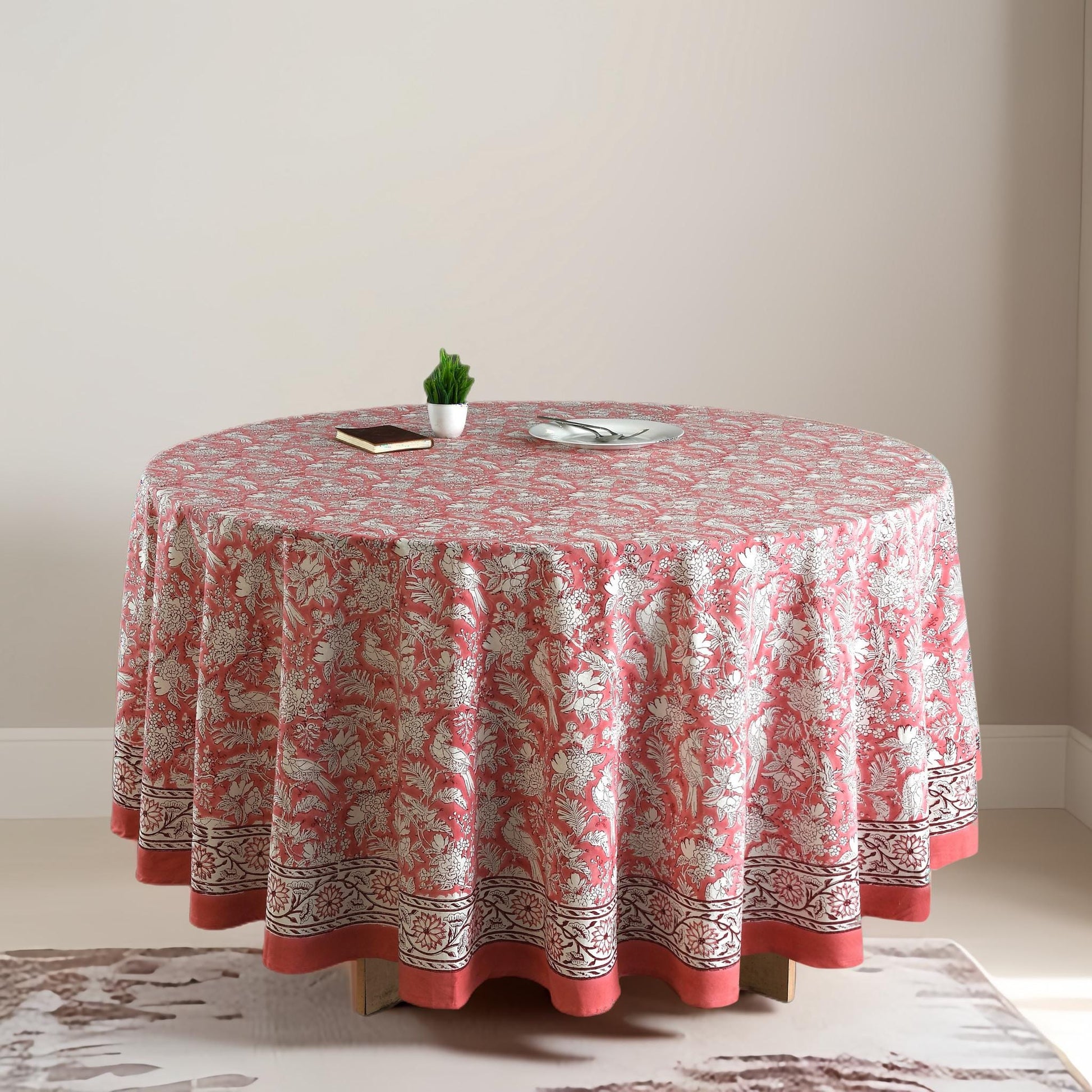 a round table with a red and white tablecloth