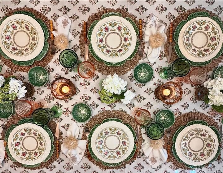 Dinner Table Setup with Plates, Placemats, Silverware, and Cotton Forest Green Tablecloth