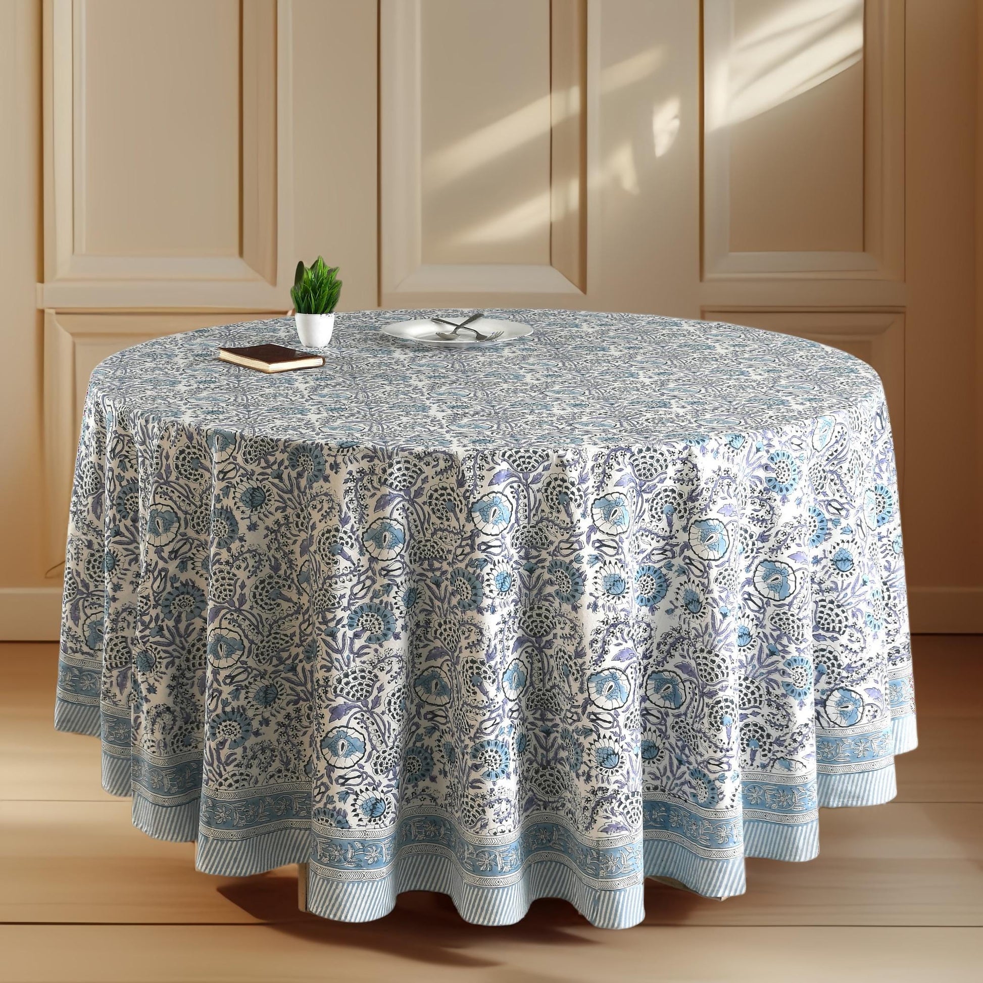 a round table with a blue and white tablecloth