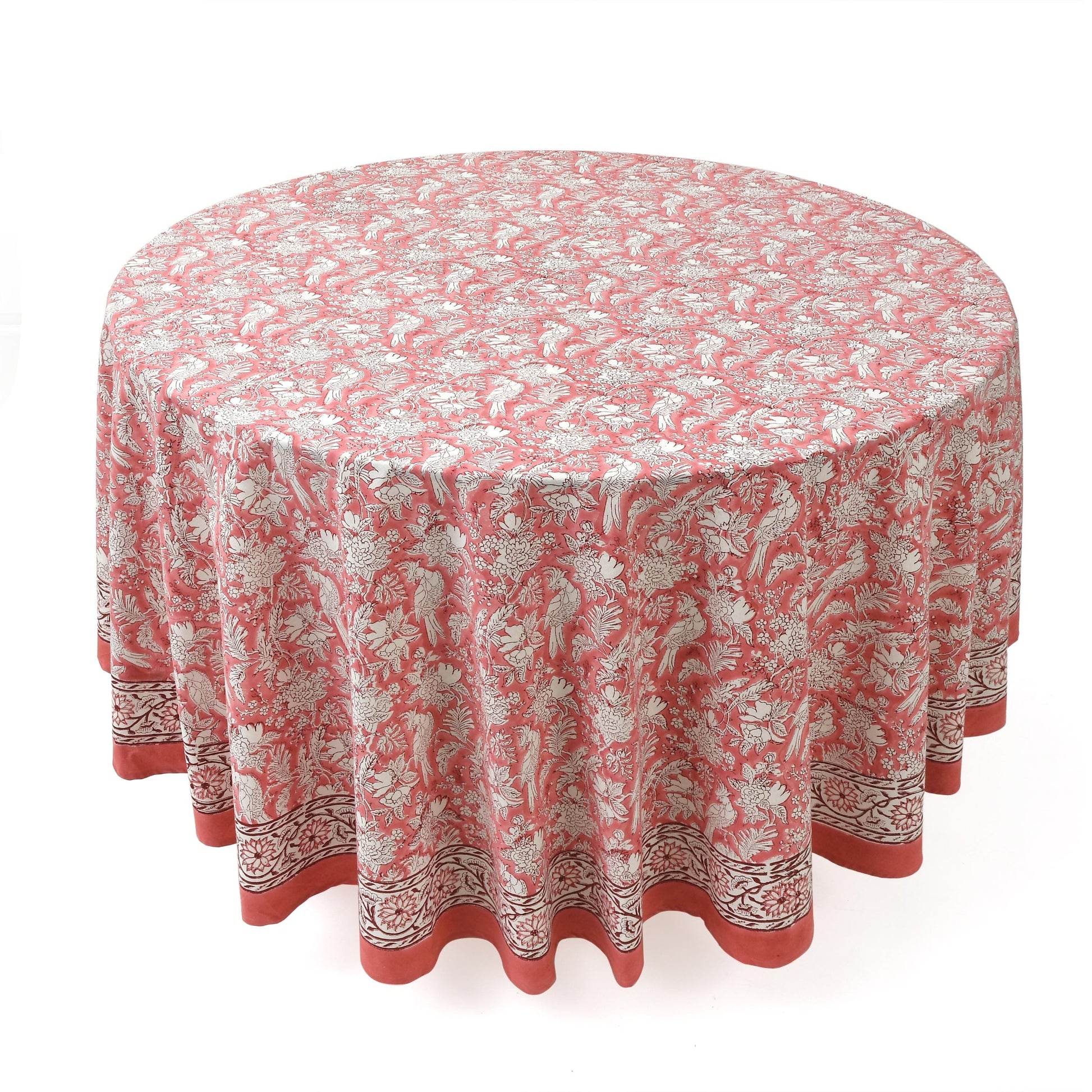 a round table with a red and white tablecloth