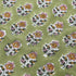 Closeup details of jade green floral cotton block print tablecloth