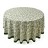 a round table with a green and white tablecloth