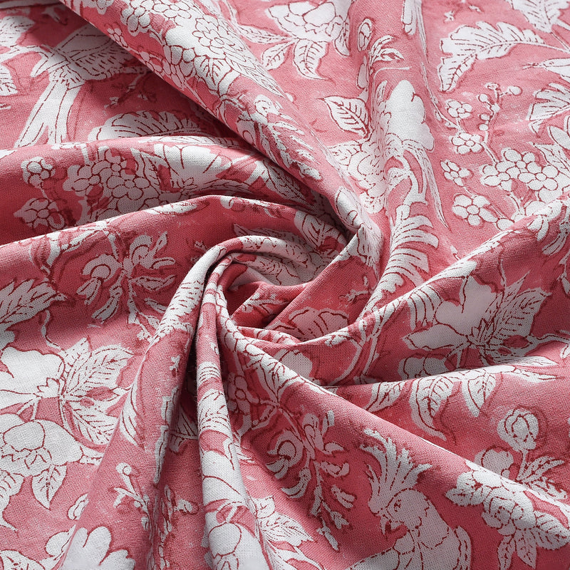 a red and white floral print fabric