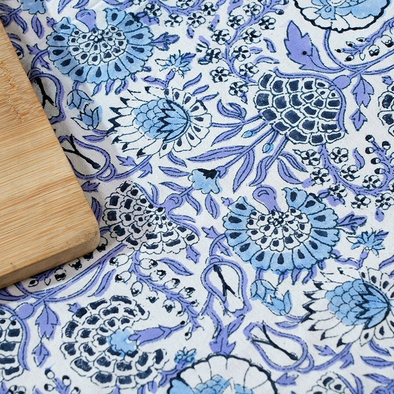 a cutting board sitting on top of a table