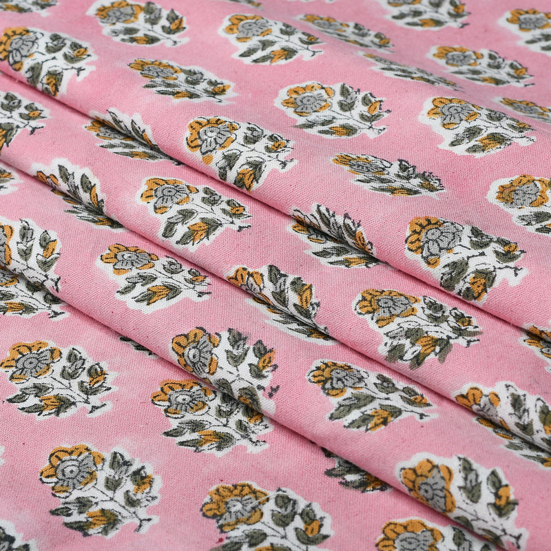 a close up of a pink fabric with flowers on it