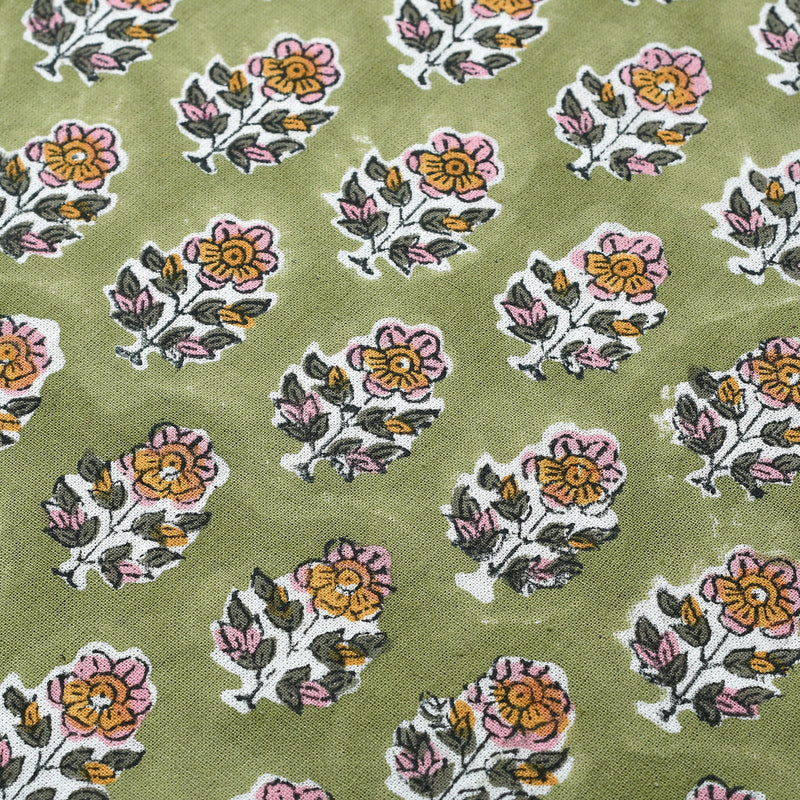 a close up of a tie with flowers on it