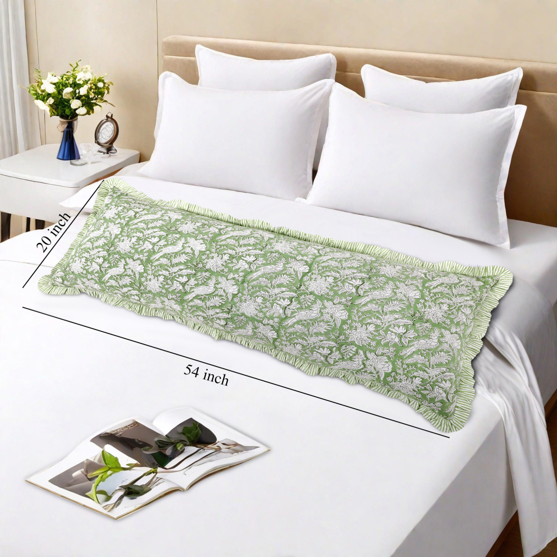 Cotton body pillow with green floral print on white bedding
